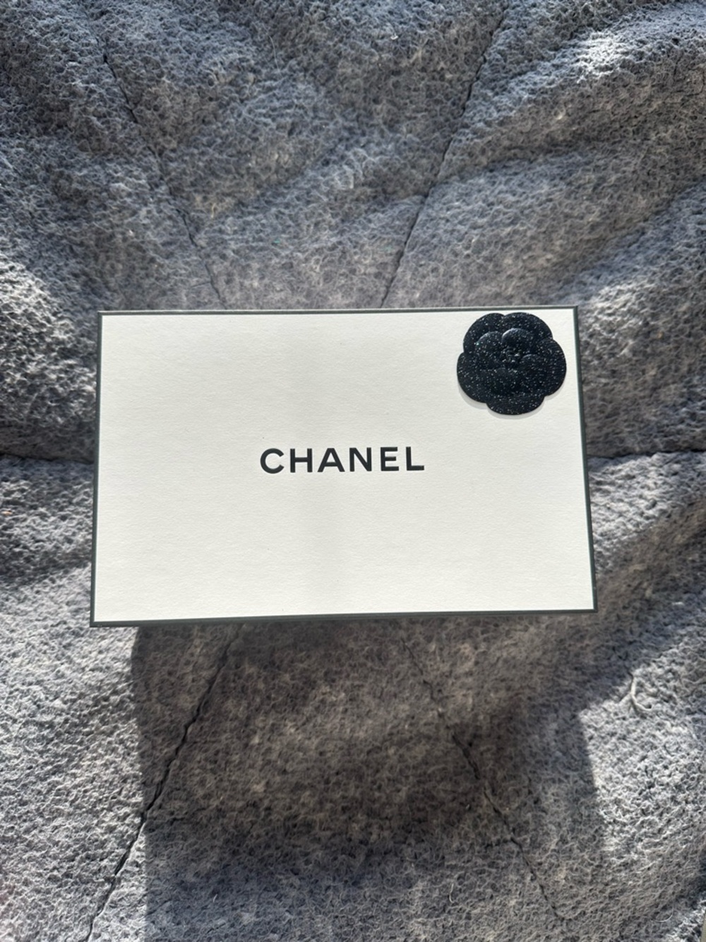 CHANEL White Box with Black Camellia Accent